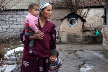  This stateless mother came to Kyrgyzstan from Tajikistan. Her children are also stateless as a result. Without papers proving her nationality, she cannot receive badly needed social assistance. Photo: UNHCR/Alimzhan Zhorobaev