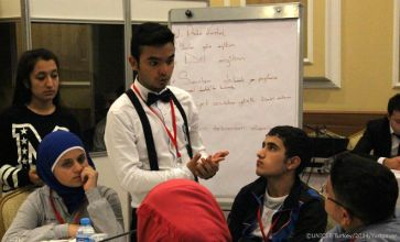  When a group of Syrian and Turkish students attend a training workshop on ‘Social Adaptation and Cohabitation’, it’s clear they already know a lot about their subject. Hands rise swiftly in response to the first question about child rights. | Source: UNICEF