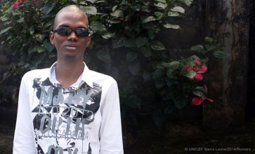 Basiru Bah, 17, explains how Ebola prevention methods present a special challenge to those who are visually-impaired. (c) UNICEF Sierra Leone/2014/Yolanda Romero