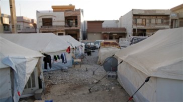 ***Photo: Cathy Otten/IRIN |  Makeshift camps have been set up in central Erbil, capital of Iraq’s Kurdish region