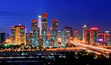 **Image: Beijing | Author: "北京国贸CBD夜景" by 网友的作品 - http://bbs.photofans.cn/thread-419083-1-1.html. Licensed under CC BY-SA 4.0 via Wikimedia Commons