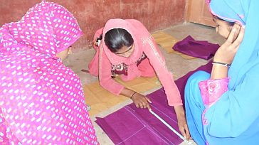  Ms Ahmad Sheikh trains other women in her village to stitch ©ILO