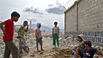 ***Photo: IRIN contributor | Yemeni children playing near a slum in central Sana'a
