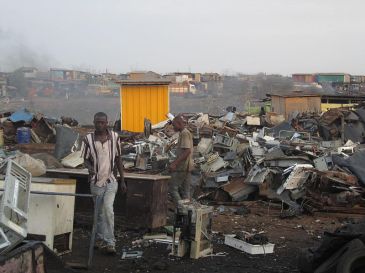 ***Photo: The E-waste centre of Agbogbloshie, Ghana, where electronic waste is burnt and disassembled with no safety or environmental considerations | Author: Marlenenapoli | Wikimedia Commons