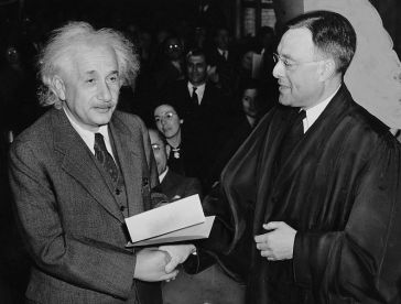 ***Albert Einstein receiving from Judge Phillip Forman his certificate of American citizenship.| Author: Al. Aumuller | World-Telegram photo grants anyone the right to use this work for any purpose, without any conditions, unless such conditions are required by law. | Wikimedia Commons