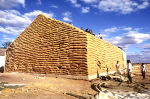 A maize haystack in Zambia. Robust inventory levels are keeping agricultural commodity prices are stable. | FAO