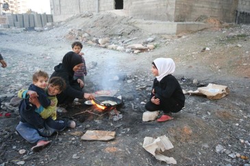 A meal being prepared at the Al-Riad shelter, Aleppo, Syria. Photo: OCHA/Josephine Guerrero