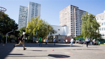 **Photo: Marie Magnin/IRIN | The former Jean-Quarré hotel school, in the 19th arrondissement of Paris has been occupied by asylum seekers since late July