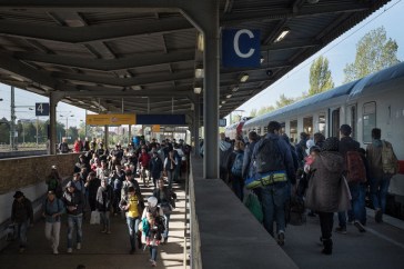 11-19-2015Migrants_Refugees