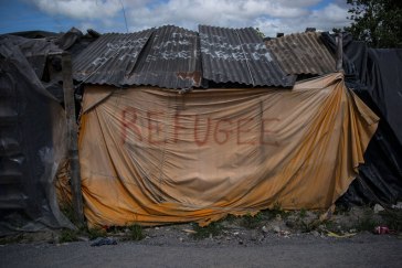 In Calais, France, thousands of migrants and refugees – many of whom have fled conflict and persecution in Sudan, Eritrea, Somalia, Afghanistan and Syria – stay in this makeshift settlement, known as ‘the jungle,’ under extremely difficult conditions, without proper housing or access to sanitation facilities. UNHCR/Olivier Laban-Mattei