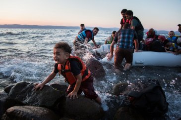 Syrian refugees arrive on the Greek island of Lesvos -- the main point of entry for refugees to Europe – after making the perilous crossing from Turkey in a rubber raft. UNHCR/Andrew McConnell