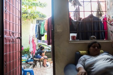 Milagro Del Socorro Romero Aguilar (right) is hosting Damaris Yamileth Turcios Lara and her children (left) in her family home while they apply for asylum in Mexico