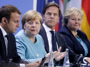 At-Berlin-summit-EU-leaders-vow-to-fight-Trump-on-climate-change