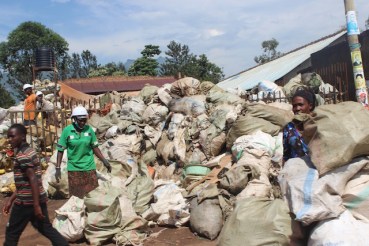 Women-in-eastern-Ugnadas-Mbale-city-collect-platic-waste-for-recycing.-Proponents-of-upcycling-say-while-such-waste-is-turned-into-reusable-plastic-products-they-end-up-polluting-the-environment.
