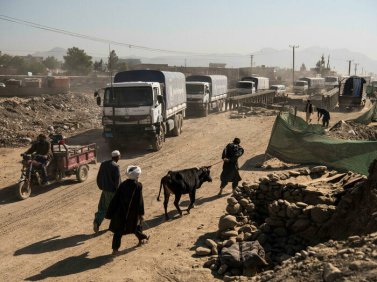 Afghanistan. World Food Programme trucks transport food