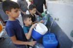 202310mena_israel_palestine_gaza_children_water.jpg